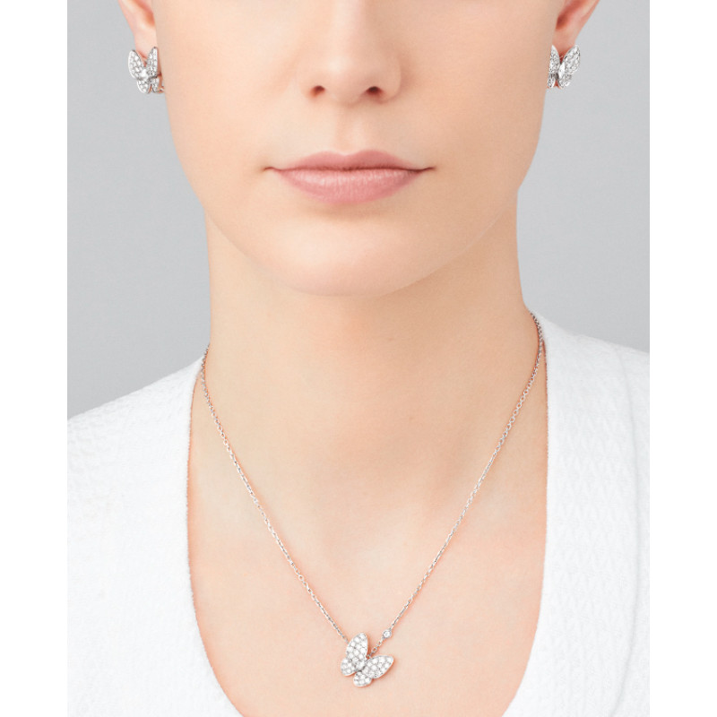 Van Cleef & Arpels Two Butterfly earrings, white gold, diamonds Van Cleef & Arpels Two Butterfly earrings, white gold, diamonds